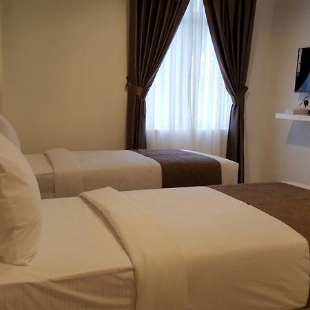 Crescendo Boutique Hotel Hock Lam Village Bagian luar foto