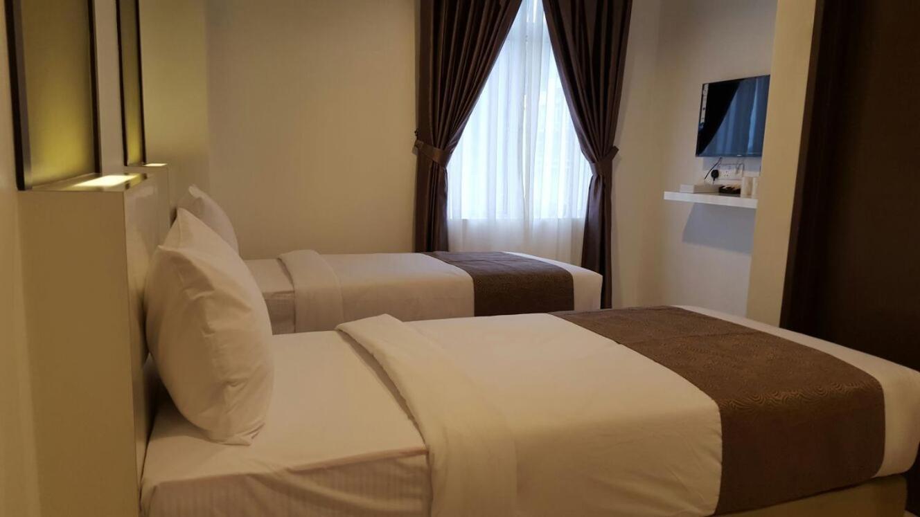 Crescendo Boutique Hotel Hock Lam Village Bagian luar foto